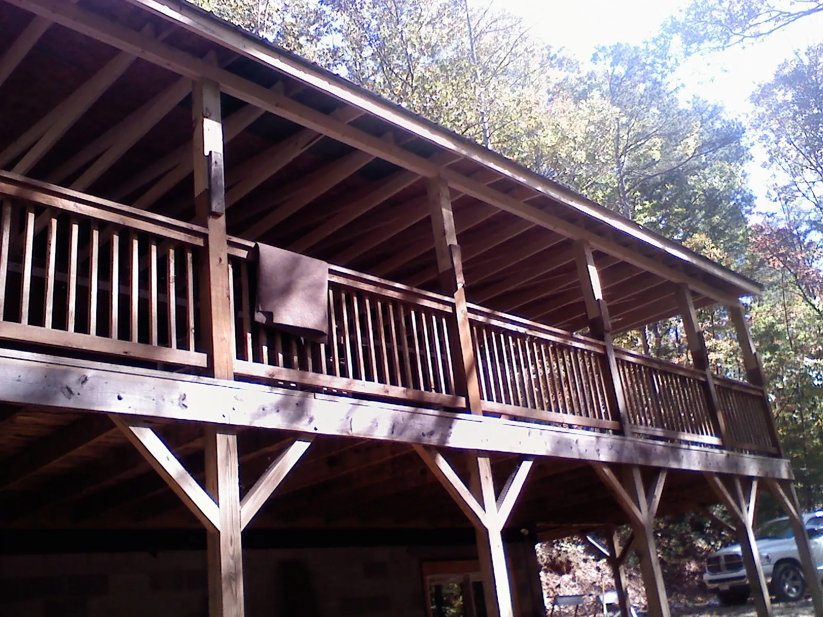 Timber framing under a new elevated porch and deck — Roof Leak Repair in Wakarusa by Roofing Brothers